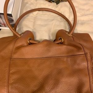 Michael Kors tan leather bag.
